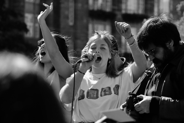 young female activist at a rally