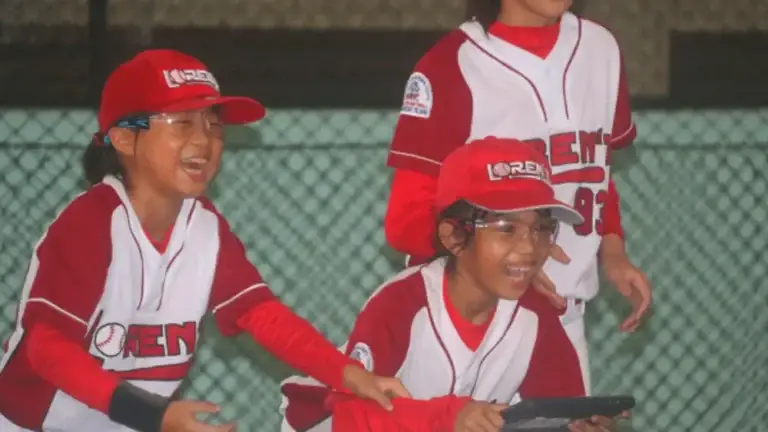 Indonesia's girls baseball team having fun while flying a drone
