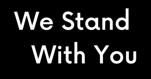 We Stand With You banner