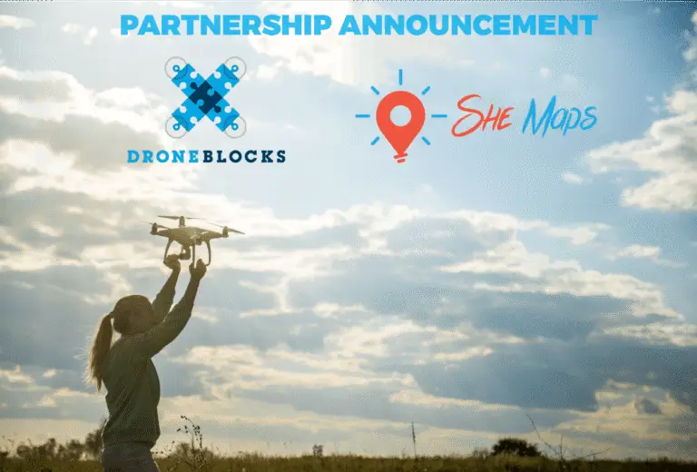 DroneBlocks Announcement a banner showing a woman holding a drone up and She Maps and DroneBlocks logos