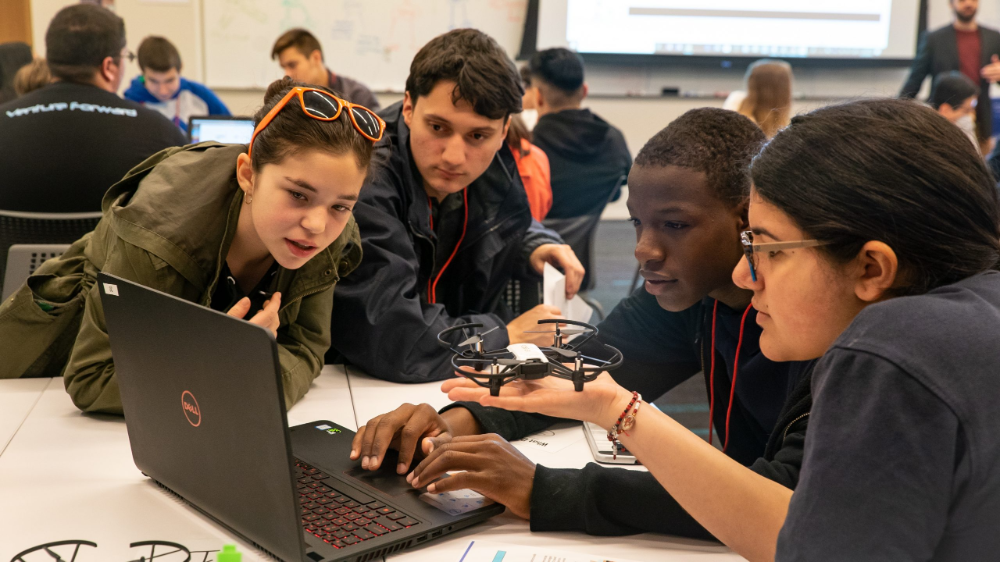 young men and women taking advanced drone programs for schools