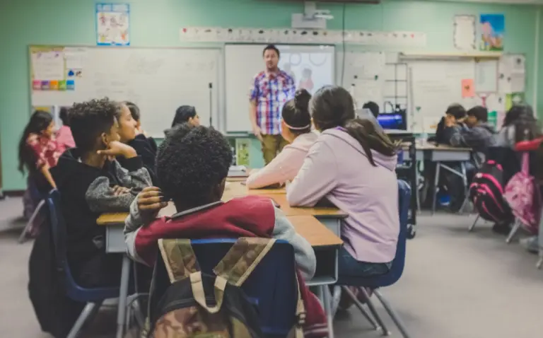 an instructor teaching diverse students
