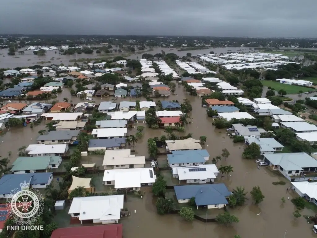 drone image of flooded townsville suburbs by joanne thomson qfes