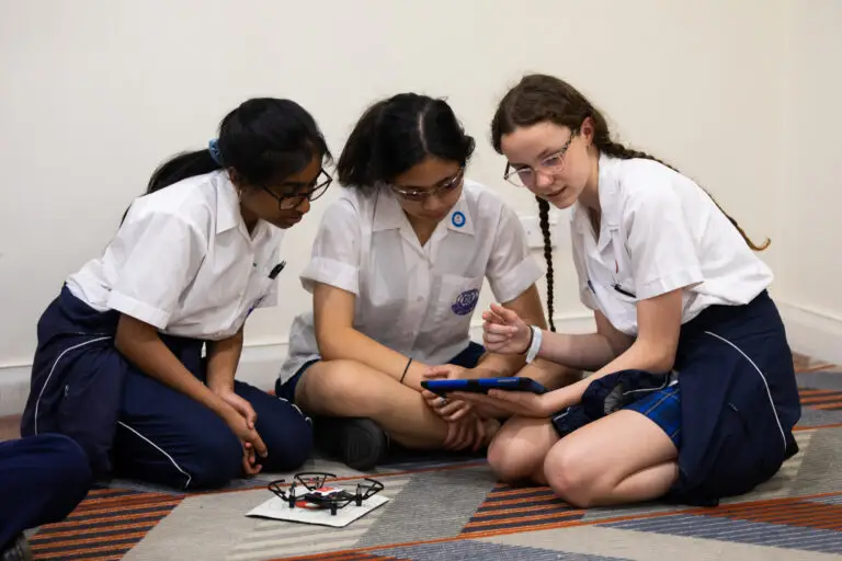 Female students with drones