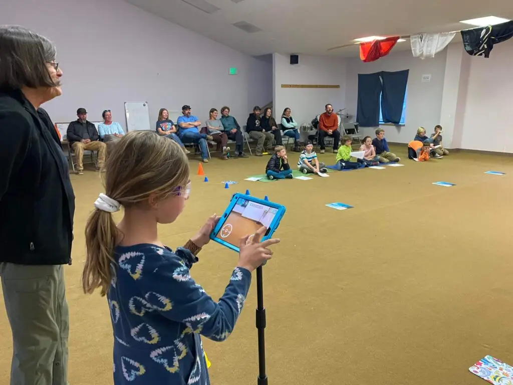 Primary student flying drone