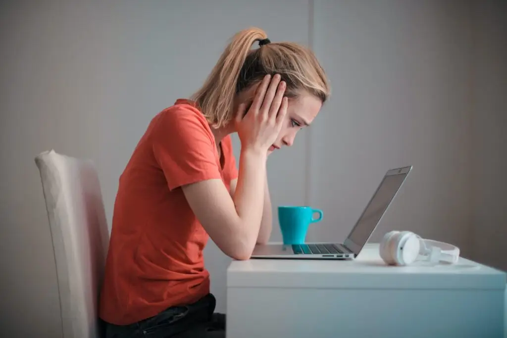 She Maps woman in front of her laptop