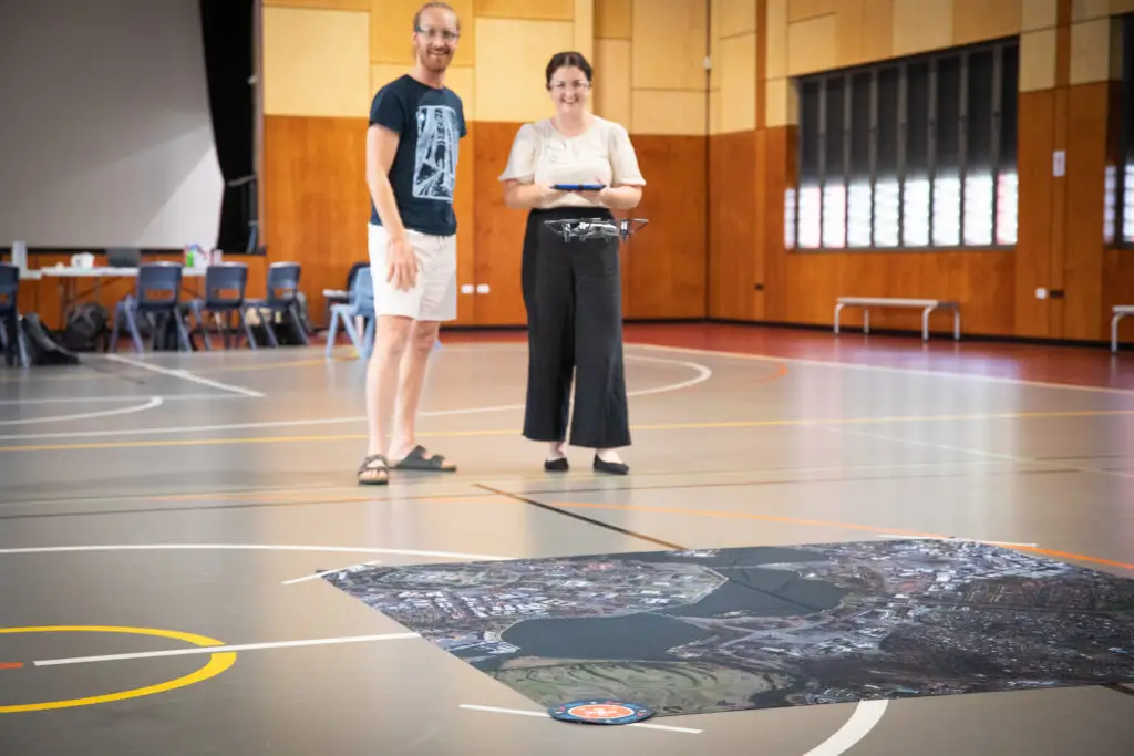 Teachers flying drones at PL She Maps