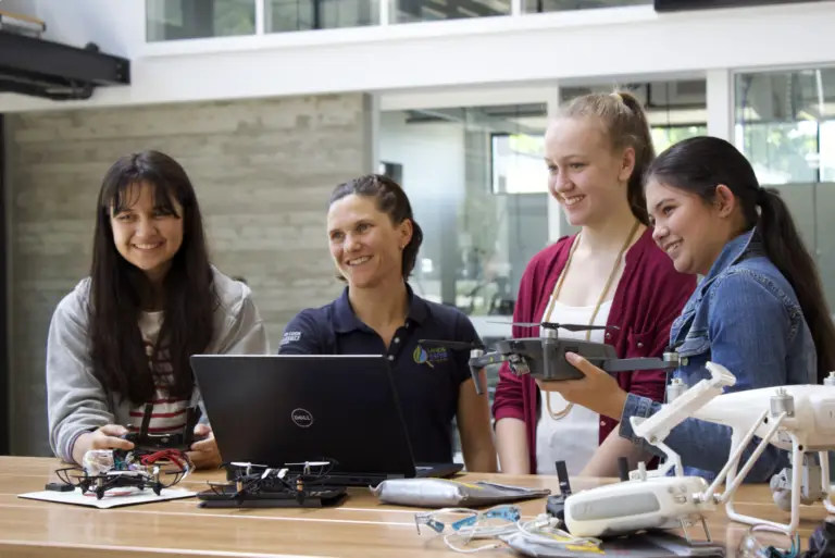 Dr Karen Joyce and students displaying drones