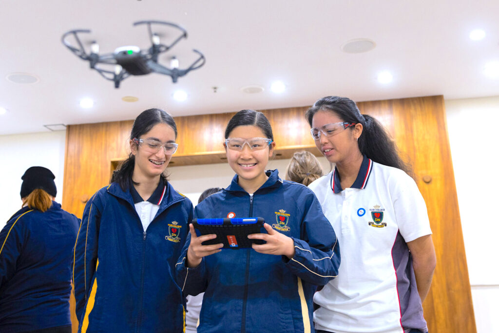 students flying drones