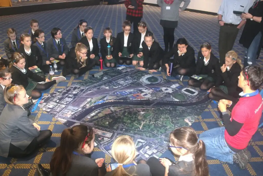 karen with students on image mat