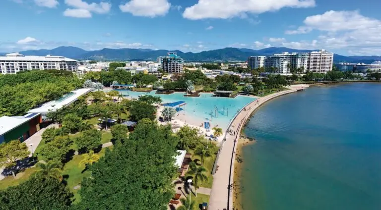 Aerial view of Cairns Esplanade Lagoon and cityscape.