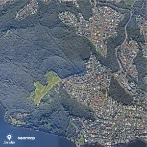 Aerial view of residential area and forest