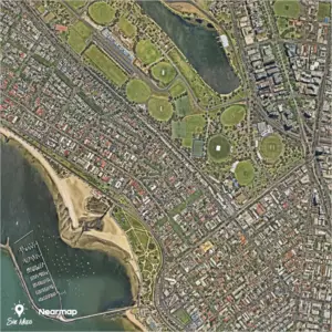 Aerial view of coastal suburb with parks