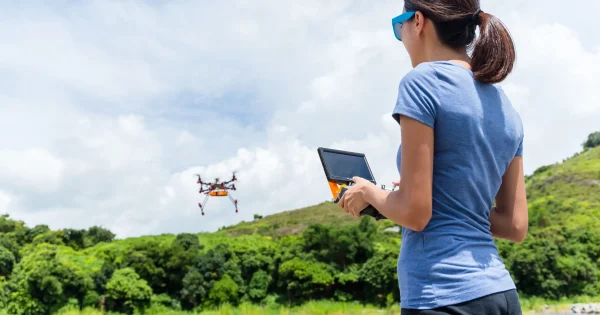 woman playing with drone