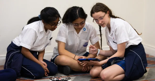 Female students with drones
