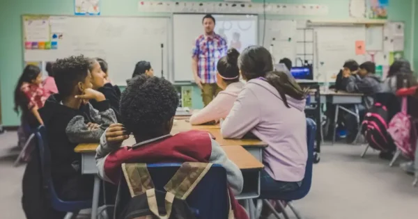 an instructor teaching diverse students