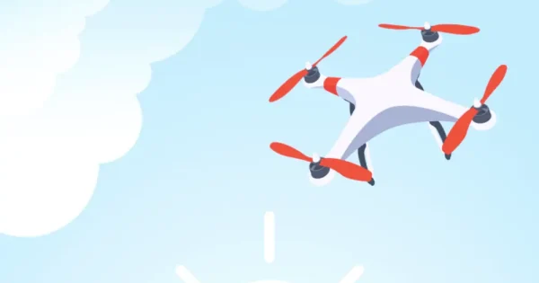 a white quadcopter drone with red propellers