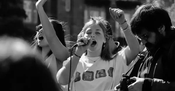 young female activist at a rally