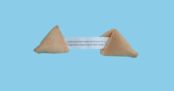 a cookie cracked open to tell your fortune she maps