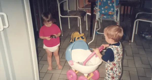 two toddlers playing with each other